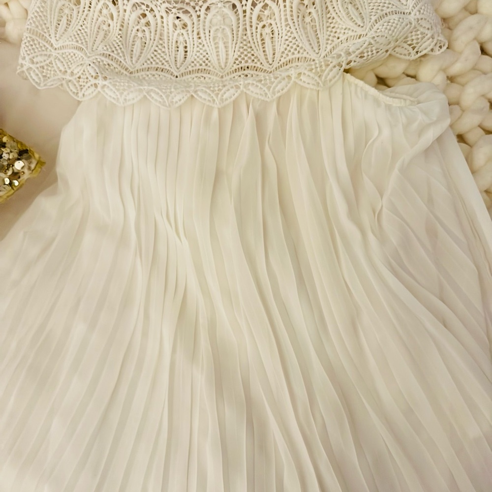 Elegant White Lace and Pleated Dress